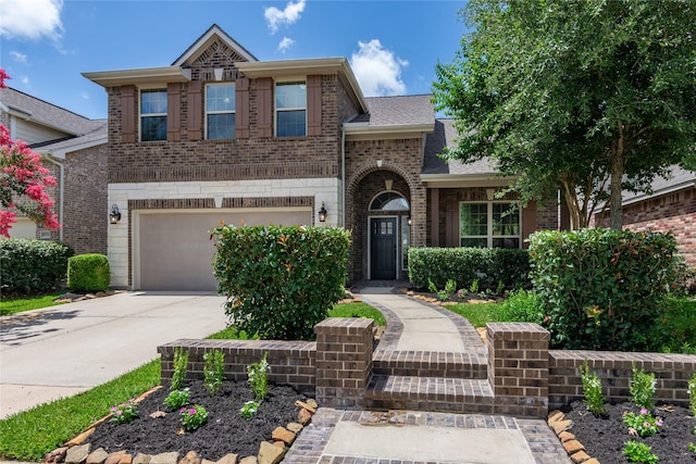 18723 Pilot Knolls Dr, Cypress, TX 77433 - traditional-style house featuring brick siding, a garage, driveway, and roof with shingles