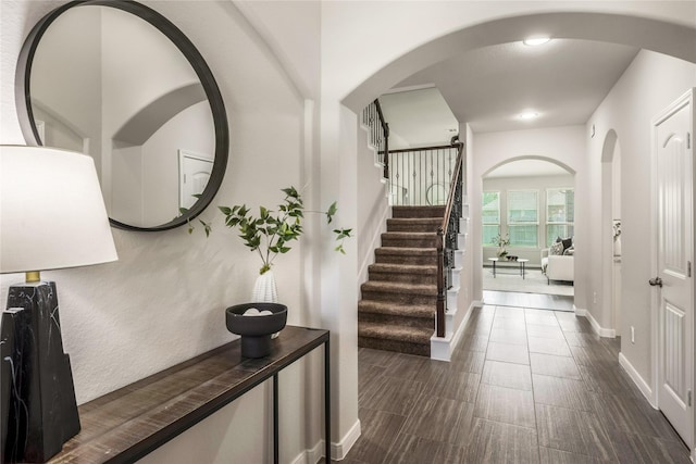 18723 Pilot Knolls Dr, Cypress, TX 77433 - entryway with stairway and arched walkways
