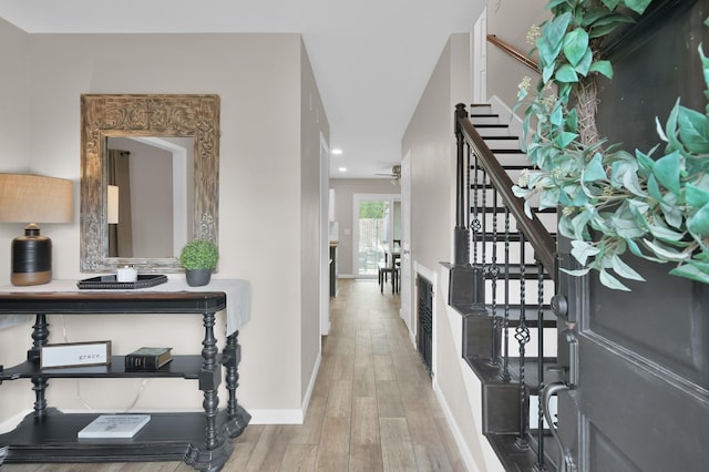 17214 Shadow Valley Dr, Spring, TX 77379 - hall featuring stairs, wood finished floors, and recessed lighting