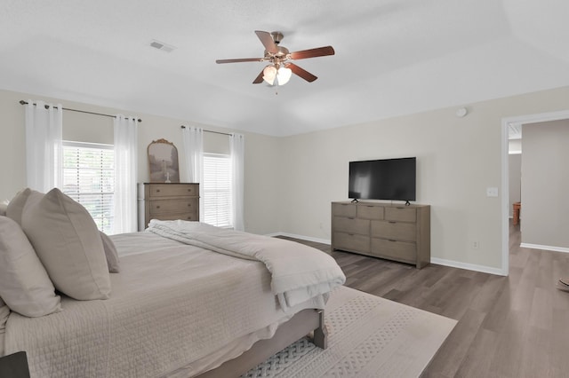 17214 Shadow Valley Dr, Spring, TX 77379 - bedroom with wood finished floors and a ceiling fan