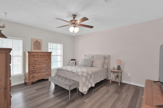 17214 Shadow Valley Dr, Spring, TX 77379 - bedroom with wood finished floors, a textured ceiling, and ceiling fan