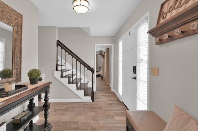 17214 Shadow Valley Dr, Spring, TX 77379 - foyer featuring stairs and light wood-type flooring