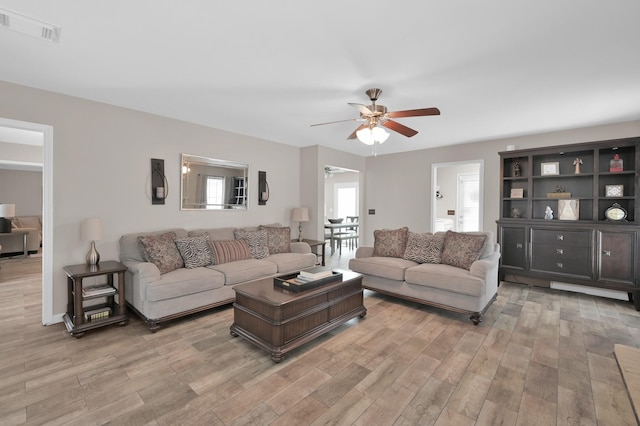 17214 Shadow Valley Dr, Spring, TX 77379 - living room with ceiling fan and light wood-type flooring