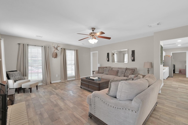 17214 Shadow Valley Dr, Spring, TX 77379 - living room with ceiling fan, light wood finished floors, and recessed lighting