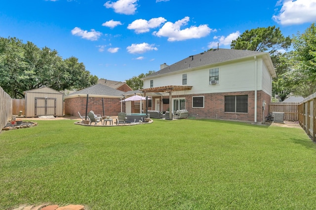 17214 Shadow Valley Dr, Spring, TX 77379 - rear view of property with a pergola, a hot tub, a fenced backyard, a shed, and a patio