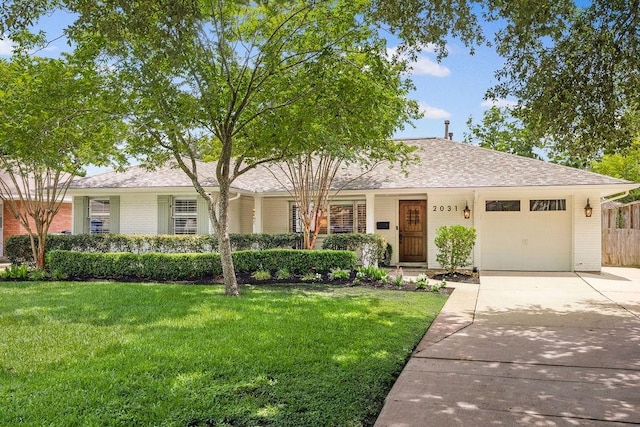 2031 Cheshire Ln, Houston, TX 77018 - single story home with driveway, an attached garage, brick siding, and roof with shingles