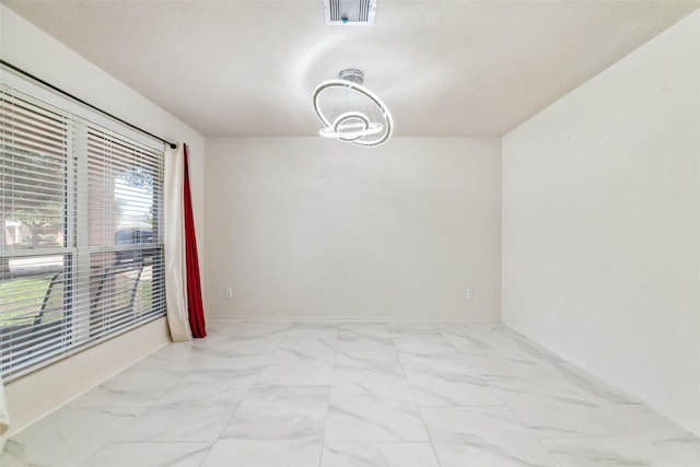 3530 Barkers Crossing Ave, Houston, TX 77084 - empty room with a chandelier and marble finish flooring