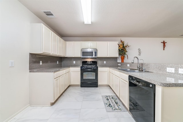3530 Barkers Crossing Ave, Houston, TX 77084 - kitchen featuring black appliances, light marble finish floors, decorative backsplash, white cabinetry, and light countertops