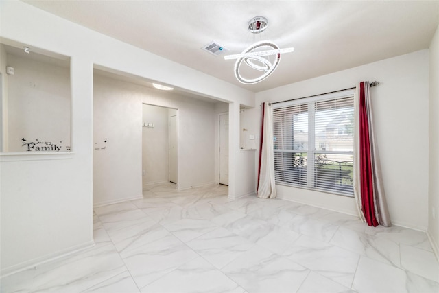 3530 Barkers Crossing Ave, Houston, TX 77084 - spare room with light marble finish flooring and a chandelier