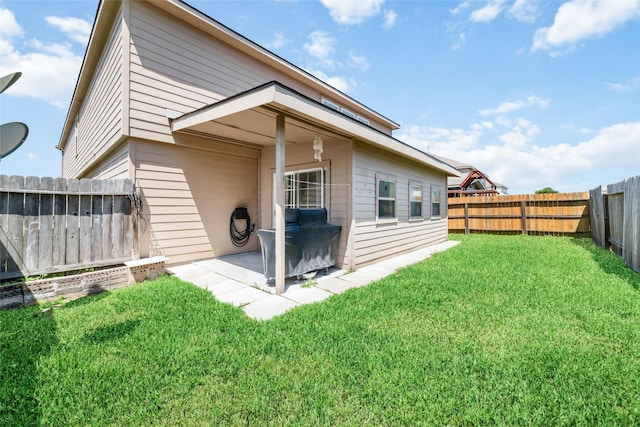 3530 Barkers Crossing Ave, Houston, TX 77084 - rear view of house featuring a fenced backyard and a patio area