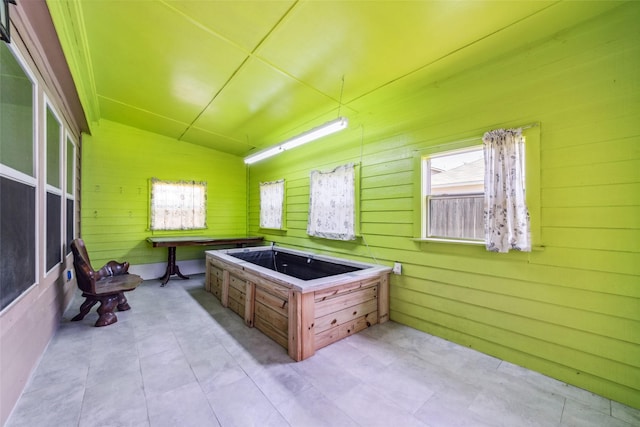3530 Barkers Crossing Ave, Houston, TX 77084 - miscellaneous room with wood walls and lofted ceiling