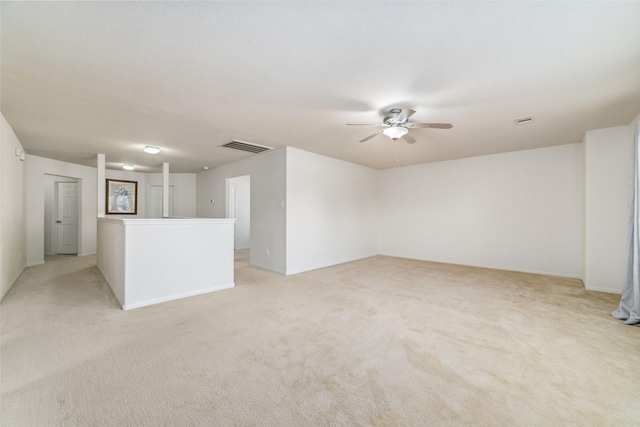 3530 Barkers Crossing Ave, Houston, TX 77084 - unfurnished living room with ceiling fan and light colored carpet