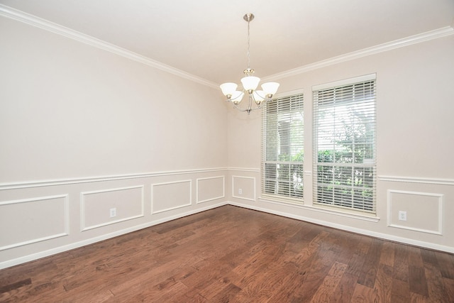 5506 Plumero Meadow Dr, Katy, TX 77494 - spare room with crown molding, a chandelier, wainscoting, wood finished floors, and a decorative wall