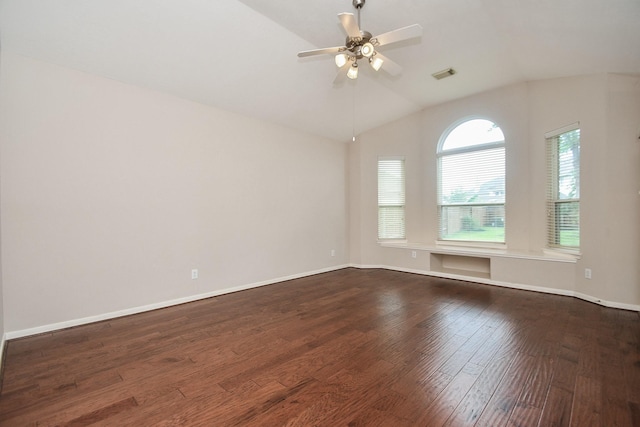 5506 Plumero Meadow Dr, Katy, TX 77494 - spare room featuring dark wood finished floors, lofted ceiling, and ceiling fan