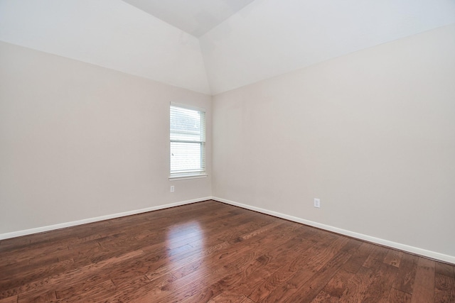 5506 Plumero Meadow Dr, Katy, TX 77494 - spare room featuring dark wood-style floors and high vaulted ceiling