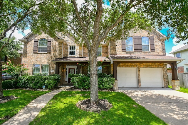 5506 Plumero Meadow Dr, Katy, TX 77494 - traditional-style home featuring a garage and concrete driveway