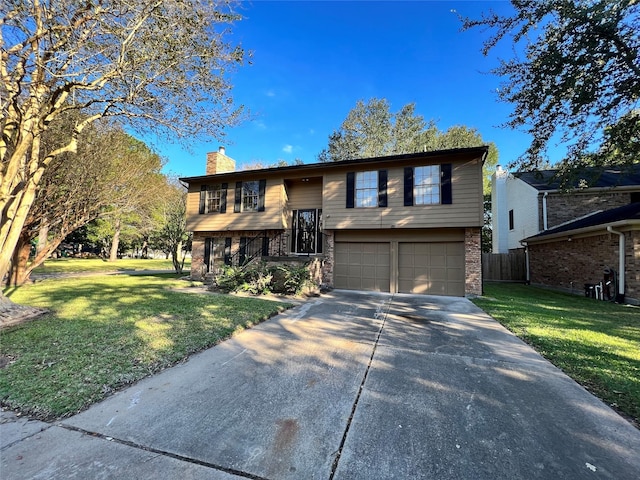 8426 Laurel Trails Dr, Houston, TX 77095 - bi-level home with a garage, driveway, a chimney, and brick siding