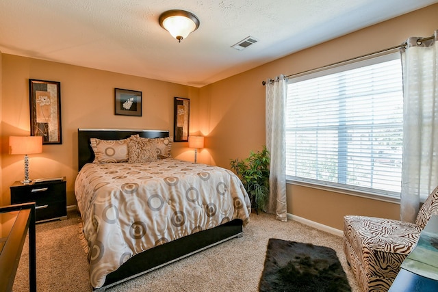 18303 June Forest Dr, Humble, TX 77346 - carpeted bedroom with baseboards