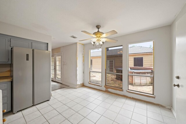10803 Shawnbrook Dr, Houston, TX 77071 - unfurnished dining area with ceiling fan and baseboards