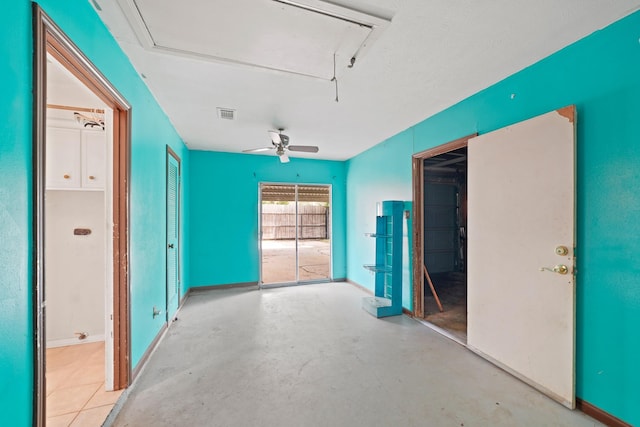 10803 Shawnbrook Dr, Houston, TX 77071 - spare room with attic access, concrete floors, and a ceiling fan