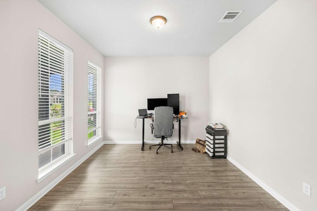 1925 Viva Rd, Bryan, TX 77807 - office area with wood finished floors and baseboards