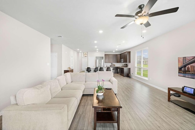 1925 Viva Rd, Bryan, TX 77807 - living room featuring ceiling fan, light wood finished floors, and recessed lighting