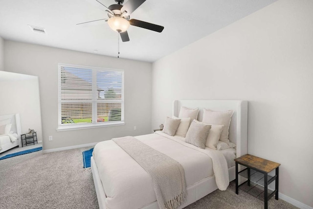 1925 Viva Rd, Bryan, TX 77807 - carpeted bedroom featuring baseboards and ceiling fan