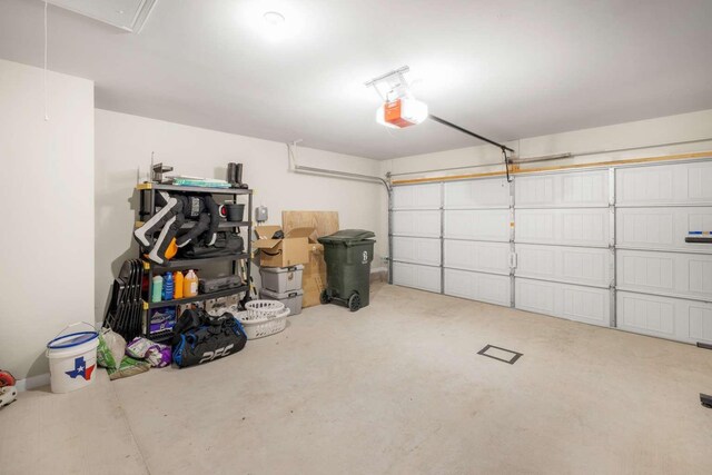 1925 Viva Rd, Bryan, TX 77807 - garage featuring a garage door opener