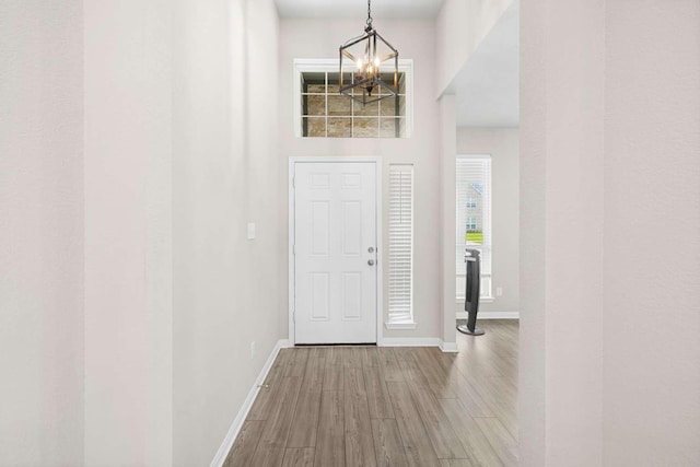 1925 Viva Rd, Bryan, TX 77807 - foyer entrance with a chandelier and wood finished floors