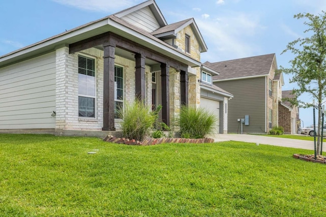 1925 Viva Rd, Bryan, TX 77807 - view of front of home featuring driveway and a front yard