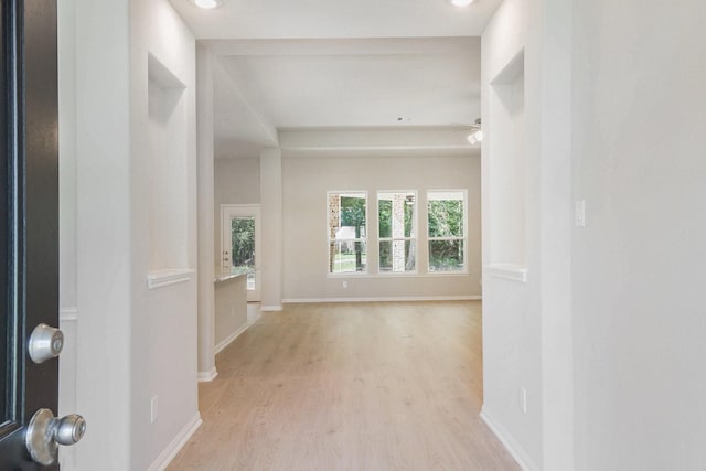 1284 Rd 66112, Dayton, TX 77535 - corridor featuring light wood-type flooring and baseboards