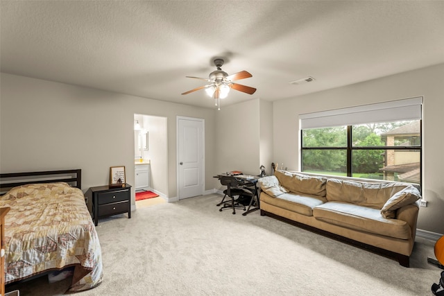 27514 Siandra Creek Ln, Spring, TX 77386 - bedroom with light carpet, connected bathroom, and ceiling fan