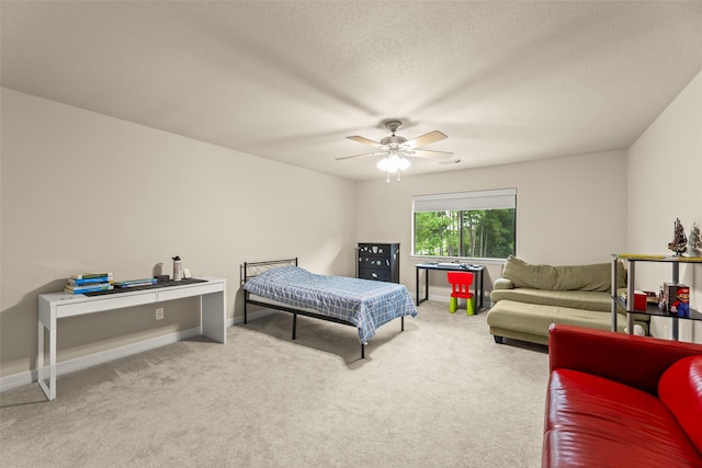 27514 Siandra Creek Ln, Spring, TX 77386 - carpeted bedroom featuring a ceiling fan and a textured ceiling