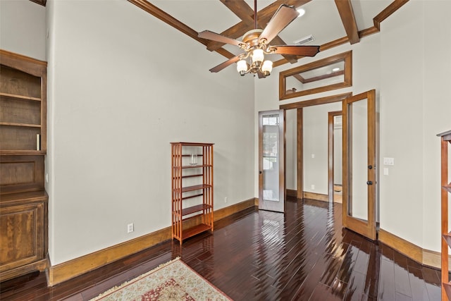 27514 Siandra Creek Ln, Spring, TX 77386 - empty room with wood-type flooring, ceiling fan, beamed ceiling, coffered ceiling, and a towering ceiling
