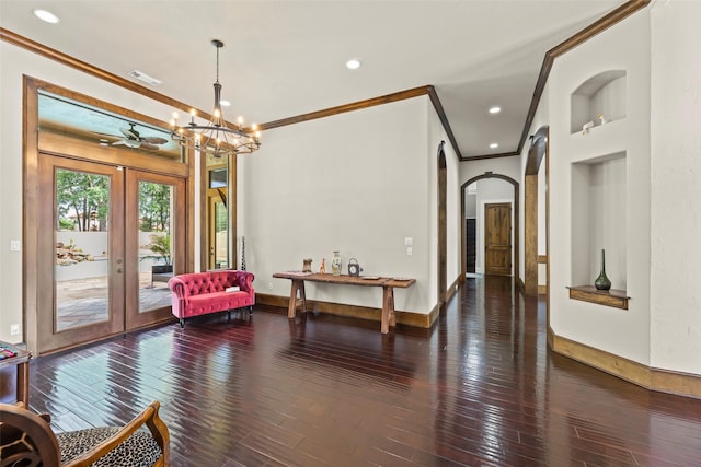 27514 Siandra Creek Ln, Spring, TX 77386 - sitting room with french doors, ornamental molding, arched walkways, a chandelier, and wood-type flooring