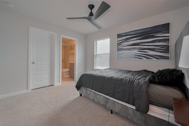 7702 Kenora Way, Richmond, TX 77407 - bedroom with carpet, ceiling fan, and ensuite bath