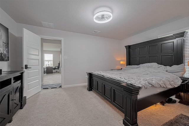 7702 Kenora Way, Richmond, TX 77407 - bedroom featuring light colored carpet and baseboards