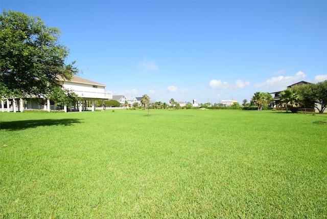 960 Alberdie Dr, Crystal Beach, TX 77650 - view of green lawn