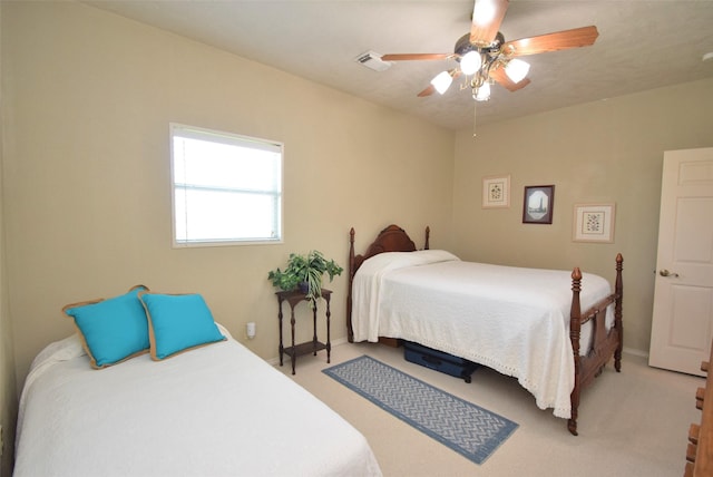 960 Alberdie Dr, Crystal Beach, TX 77650 - bedroom featuring light colored carpet and a ceiling fan