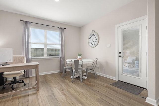 13709 Gaff Rig Dr, Texas City, TX 77510 - dining space with light wood-type flooring and an office area