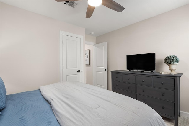 13709 Gaff Rig Dr, Texas City, TX 77510 - bedroom with light colored carpet and a ceiling fan