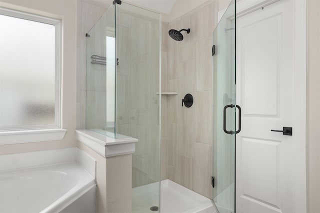 13709 Gaff Rig Dr, Texas City, TX 77510 - full bath featuring a stall shower and a bath