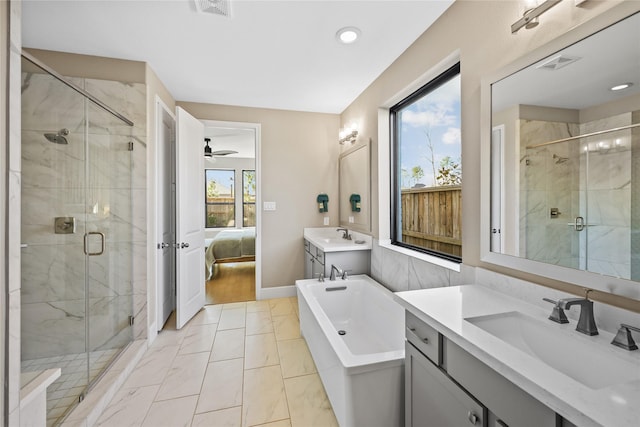21726 Grayson Highlands Way, Porter, TX 77365 - ensuite bathroom featuring marble finish flooring, vanity, a stall shower, a tub to relax in, and ceiling fan