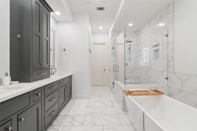 1403 Isabella St, Houston, TX 77004 - full bath with a freestanding tub, a shower stall, marble look tiles, double vanity, and recessed lighting
