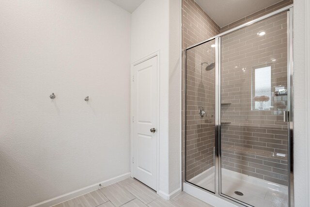 4327 Camden Springs Trl, Porter, TX 77365 - bathroom featuring a stall shower and tile patterned floors