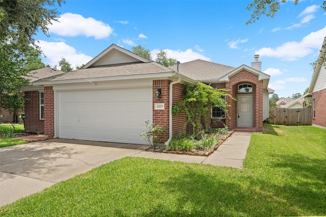 2207 Highland Hills Dr, Conroe, TX 77304 - view of front of house with brick siding, a shingled roof, a garage, driveway, and a chimney