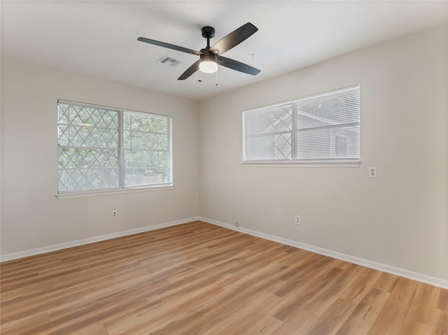 1705 Spruce St, Bay City, TX 77414 - empty room with light wood finished floors and ceiling fan