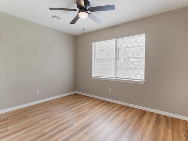 1705 Spruce St, Bay City, TX 77414 - unfurnished room with light wood-style floors and ceiling fan