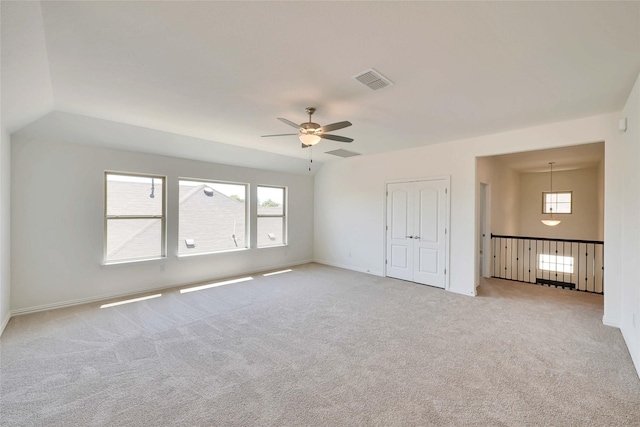 27503 Clear Breeze Dr, Katy, TX 77493 - carpeted empty room featuring ceiling fan and plenty of natural light