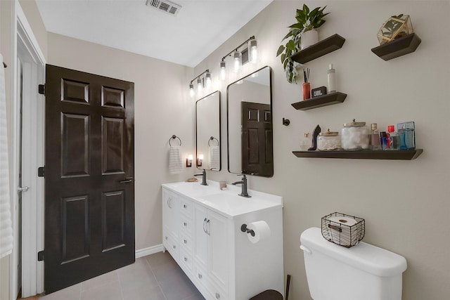 2222 3rd St, Rosenberg, TX 77471 - bathroom with double vanity and tile patterned floors